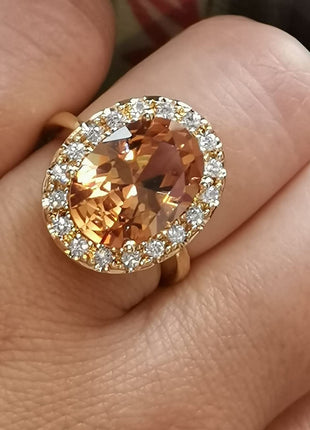 GUIDECUN Golden Tone Oval Shaped Champagne CZ & Round Clear Cubic Zirconia Halo Cocktails Engagement Ring for Woman (US Size 7)