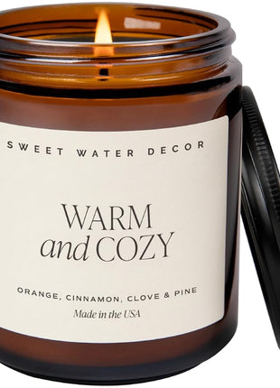 Sweet Water Decor Warm & Cozy Candle, 9oz Amber Glass Jar, Winter Scents | Cozy Scented Candle with Orange Peel, Cinnamon, Ginger & Clove Notes, Black Lid, 40+ Hour Burn Time, Poured in the USA