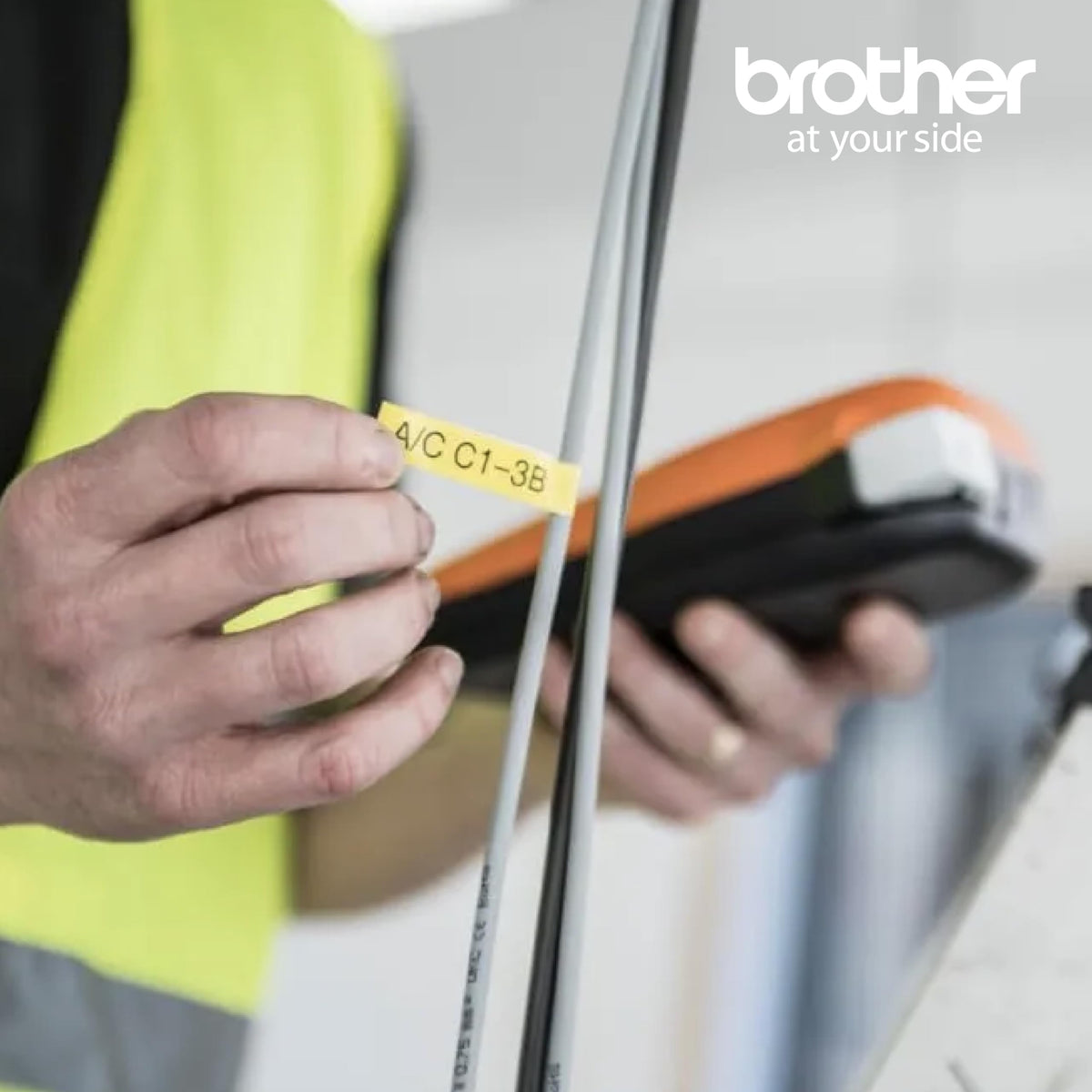 Brother PTE110 Entry Level Industrial Handheld Labeling Tool Kit - Up to 12mm Labels, Orange