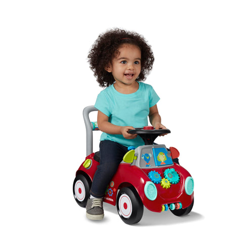 Radio Flyer Busy Buggy, Toddler Ride On Toys, for Toddlers 1-3 | 3-in-1 Push Walker Ride On Car with 17 Sensory Activities, Anti-Tip Feature, Horn and Gears, 42 lb Capacity