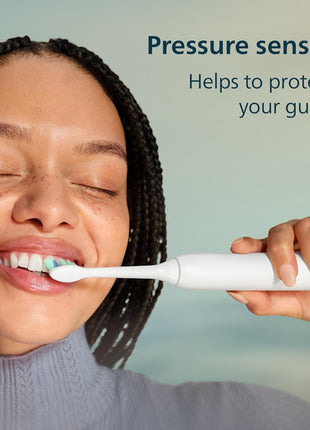 Philips Sonicare 4100 Rechargeable Electric Toothbrush, with Pressure Sensor, 2 Intensity Settings, SmarTimer and QuadPacer, 14-Day Battery Life, White, Model HX3681/23