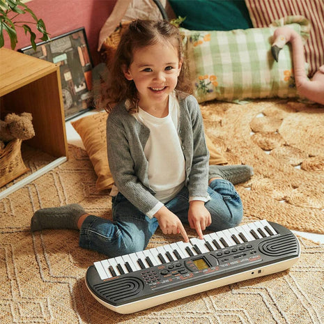 Casio Casiotone SA-81 – Compact Keyboard with 100 Tones & 50 Rhythms | Fun for Beginners | Great for Music Practice and Learning | 44 Mini Keys, 100 Built-in Tones, 32-Note Polyphony, 10 Songs, AC or 6×aa Power, Headphone Jack