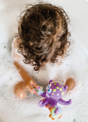 Nuby Floating Octopus with 3 Hoopla Rings - Baby & Toddler Bath Toy - No Hole Design Keeps Moisture Out - Fine Motor Skills - 18+ Months - Great Baby Pool Toys | 3 Hoopla Rings