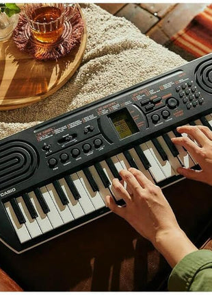 Casio Casiotone SA-81 – Compact Keyboard with 100 Tones & 50 Rhythms | Fun for Beginners | Great for Music Practice and Learning | 44 Mini Keys, 100 Built-in Tones, 32-Note Polyphony, 10 Songs, AC or 6×aa Power, Headphone Jack