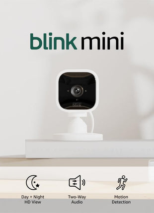 Blink Mini - Compact indoor plug-in smart security camera, 1080p HD video, night vision, motion detection, two-way audio, easy set up, Works with Alexa – 2 cameras (White)