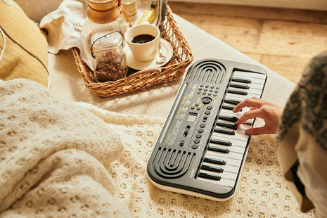 Casio Casiotone SA-51 – 32-Key Compact Digital Keyboard | Portable Electronic Piano with 100 Tones, 50 Rhythms & Built-In Songs | Battery Powered