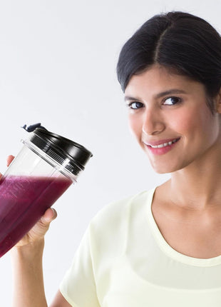 Ninja Fit Compact Personal Blender, 700W, (2) 16oz Cups, QB3001SS | 700-watt base blends smoothies, shakes & frozen drinks. (2) 16-oz to-go cups w/ spout lids. Dishwasher safe.