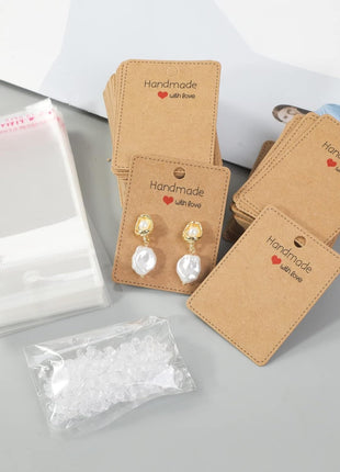 Femtindo 150 Pack Earring Cards for Jewelry Packaging DIY Earrings Holder Display Card with Bag for Studs Selling (Brown(Earring Card), 5x6.5cm)