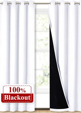 NICETOWN 100% Blackout Window Curtain Panels, Cold and Full Light Blocking Drapes with Black Liner for Nursery, 84 inches Drop Thermal Insulated Draperies (White, 2 Pieces, 52 Wide Each Panel)