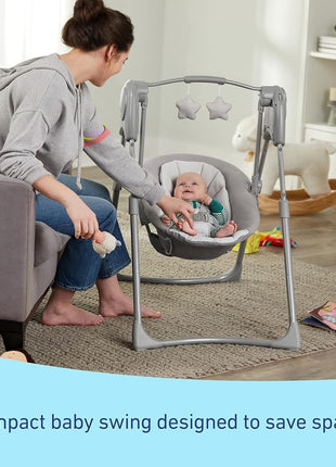 Graco Slim Spaces Compact Baby Swing, Space Saving Portable Bay Swing with Height Adjustable Legs & Soft Toys, Reign