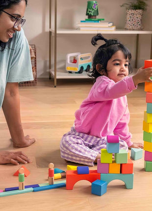 LOVEVERY | The Block Set | Solid Wood Building Blocks and Shapes + Wooden Storage Box, 70 Pieces, 18 Colors, 20+ Activities, Toddler Block Set and Converts into a Pull Car, Ages 12 to 48+ months
