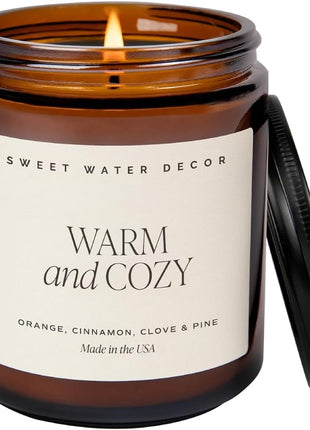 Sweet Water Decor Warm & Cozy Candle, 9oz Amber Glass Jar, Winter Scents | Cozy Scented Candle with Orange Peel, Cinnamon, Ginger & Clove Notes, Black Lid, 40+ Hour Burn Time, Poured in the USA