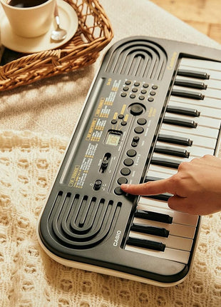 Casio Casiotone SA-51 – 32-Key Compact Digital Keyboard | Portable Electronic Piano with 100 Tones, 50 Rhythms & Built-In Songs | Battery Powered