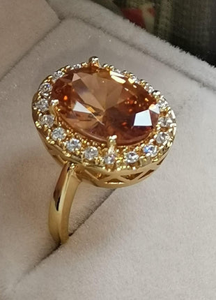 GUIDECUN Golden Tone Oval Shaped Champagne CZ & Round Clear Cubic Zirconia Halo Cocktails Engagement Ring for Woman (US Size 7)