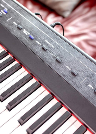 Alesis Recital ? 88 Key Digital Piano Keyboard with Semi Weighted Keys, 2x20W Speakers, 5 Voices, Split, Layer and Lesson Mode, Fx and Piano Lessons