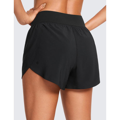 CRZ YOGA High Waisted Dolphin Athletic Running Shorts for Women 3 inch High Split Comfy Mesh Liner for Gym Workout Track Black Medium