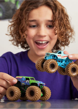 Monster Jam, Mystery Mudders 2-Pack Monster Trucks, Official 1:64 Die-Cast Vehicles, Wash to Reveal (Styles Will Vary), Kids Toys for Boys 3 and Up