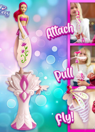 Sky Dancers Flying Doll, Pull-String Toy, No Batteries, Fuchsia Fantasy | Really flies; Pull-string powered; No batteries; Indoor/outdoor play; Screen-free fun; Ages 6+