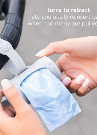 Ubbi Retractable Bag Dispenser for Diaper Bag, Gray | Portable Bag Holder for Travel, Clips to Stroller or Diaper Bag, Newborn Baby Essentials, Includes 24 Lavender Scented Bags