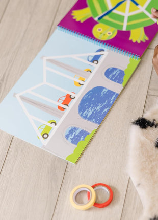 Melissa & Doug Tape Activity Book for Kids with 4 Easy-Tear Tape Rolls (Blue, Green, Red, Yellow) & 20 Reusable Scenes on Spiral-Bound Sheets, Road Trip Activities & Travel Toys for Kids Ages 4+