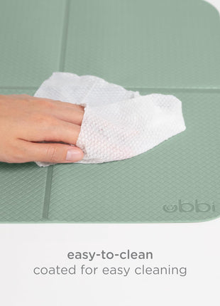 Ubbi On-the-Go Diaper Changing Baby Mat, Sage | Soft & Comfortable Diaper Bag Accessory Must Have for Newborns, Easy to Clean, Portable Folding Pad, Traveling Accessories