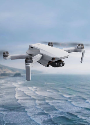 DJI Mini 4K Camera Drone Combo, Drone with 4K UHD Camera for Adults, Under 249 g, 3-Axis Gimbal Stabilization, 10km Video Transmission, Auto Return, 2 Batteries for 62-Min Max Flight Time, QuickShots