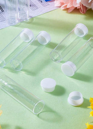 Craftdady 100Pcs Transparent Clear Plastic Small Empty Storage Tubes Bead Container Set Test Bottles Organizers Boxes with Lid 2.16x0.59 (55x15mm)